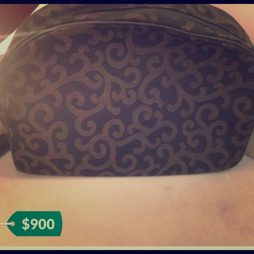 Saint Laurent Vintage pursue